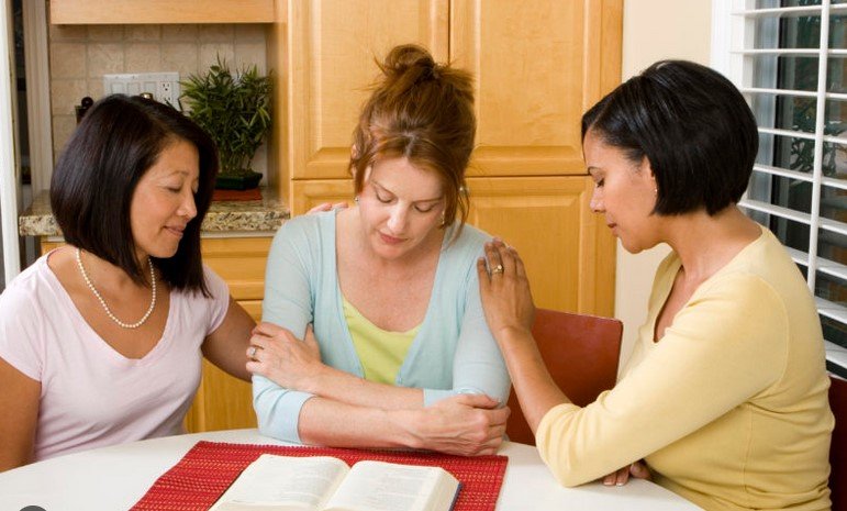 women having a bible study session